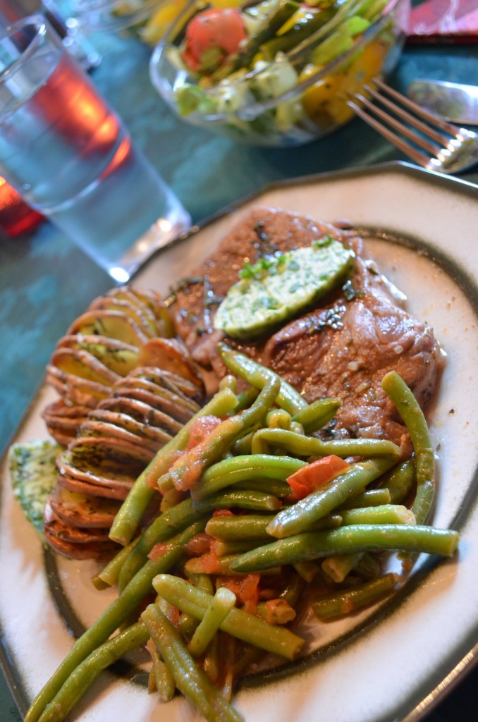 Beef steak, hasselback potatoes, green beans and wild garlic butter recipe for mother's day by ginger, lemon and spice